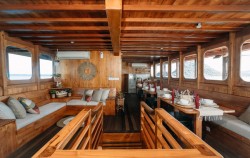 Indoor Dining Area,Komodo Boats Charter,Private trip by Andamari Deluxe Phinisi